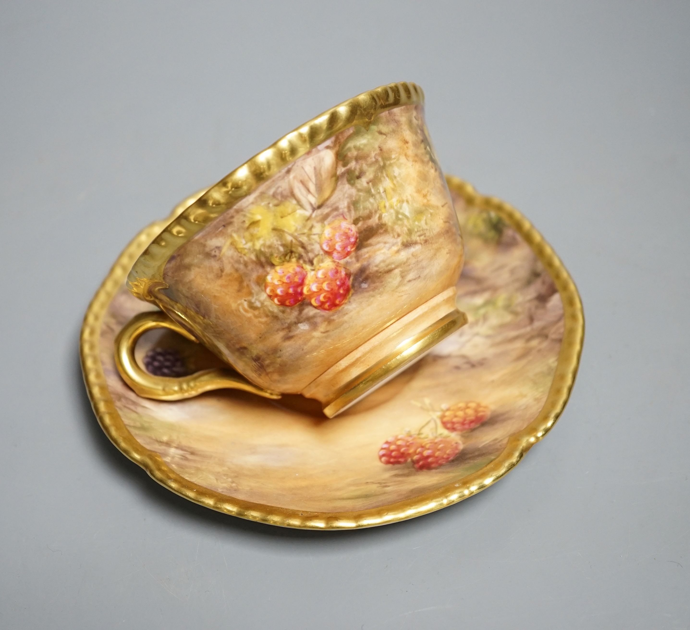 A Royal Worcester fruit painted large tea cup and saucer, signed P. Love, height 7cm overall